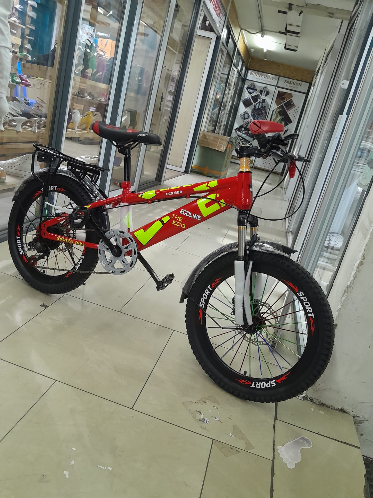 Size 20 bike with gears and front suspension.